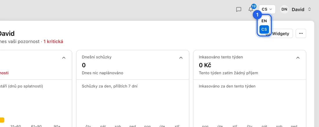 Klikněte v horní liště na tlačítko EN nebo CS, hned vlevo od svého jména.
