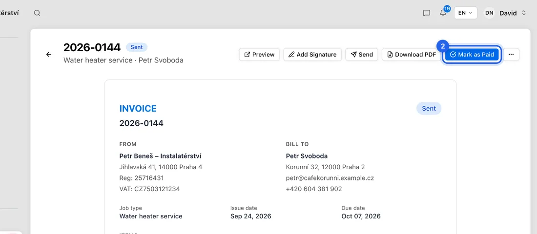 Click Mark as Paid at the top of the page.